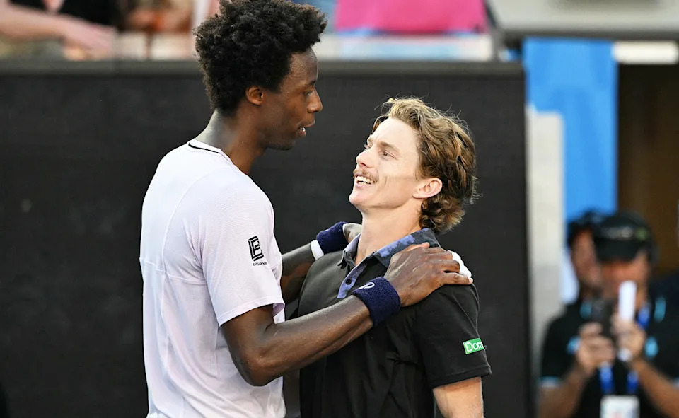 Dane Sweeny, pictured here embracing Gael Monfils after ending the French star's Australian Open career.