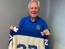 Toronto Maple Leafs great Darryl Sittler holds his jersey from his famed 10-point game. 