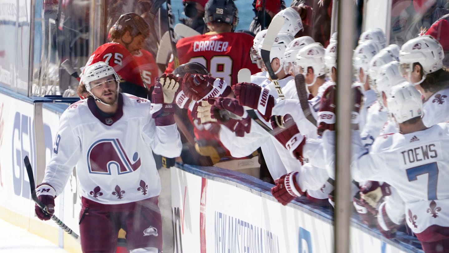 Feb 20, 2021; Stateline, NV, USA; Colorado Avalanche defenseman Samuel Girard (49) celebrates after scoring a goal against the Vegas Golden Knights in the first period of a NHL Outdoors hockey game at Lake Tahoe. Mandatory Credit: Kirby Lee-Imagn Images