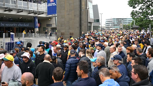 Fans queue up outside the ’G on Boxing Day.