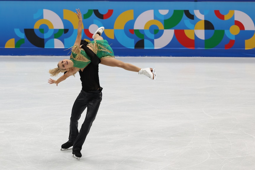 Jason Chan lifts Holly Harris