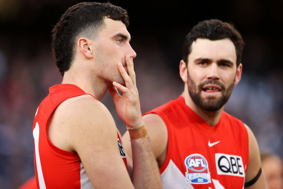 Paddy McCartin (right) and his brother Tom (left) after the Swans’ 2022 grand final loss to Geelong.