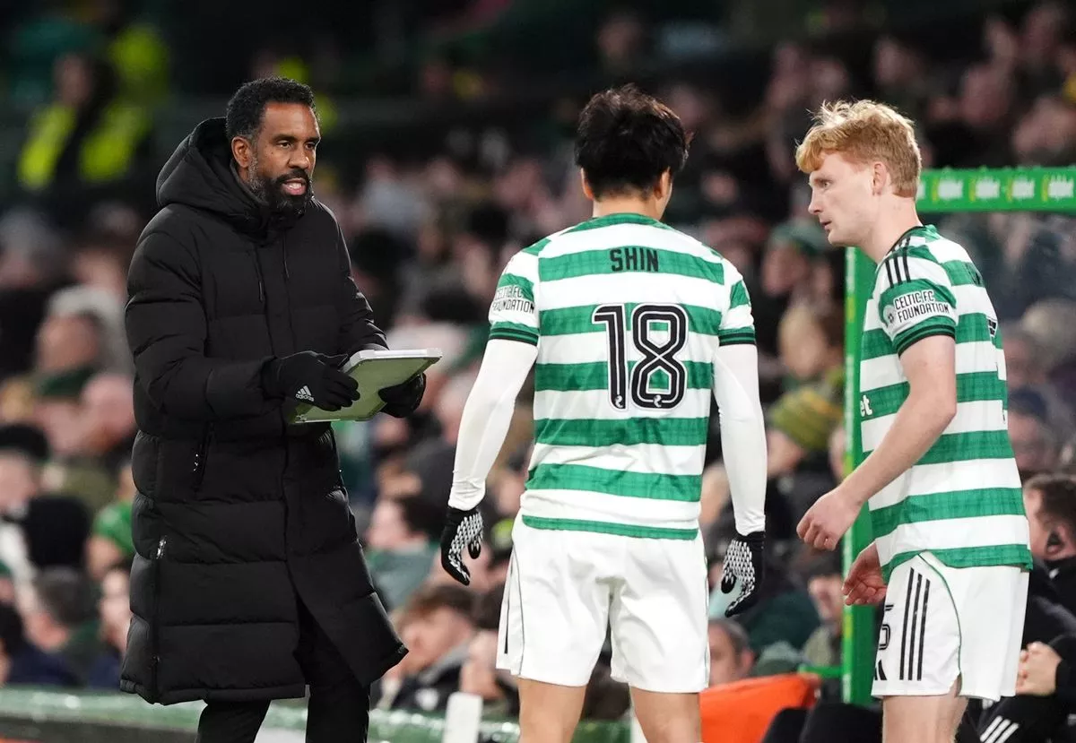 Wilfried Nancy (left) talks to the Celtic players