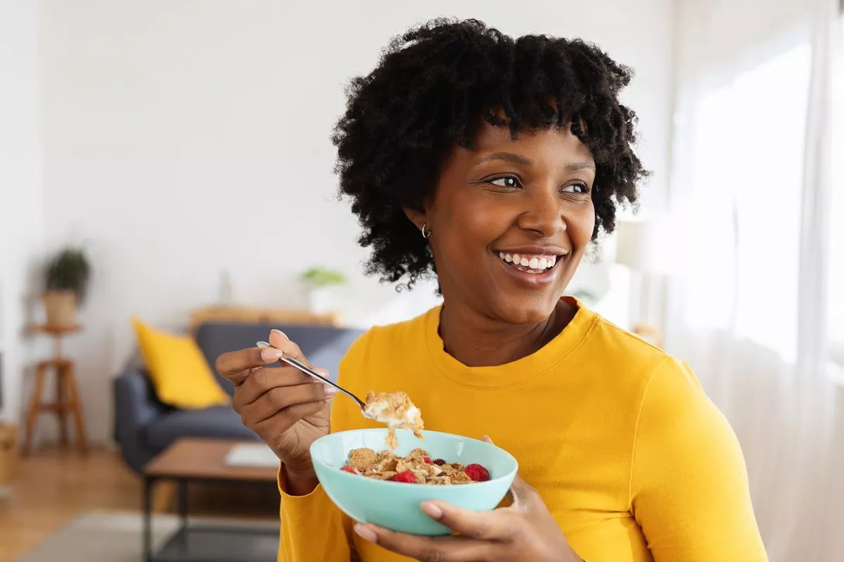 Woman eating breakfast