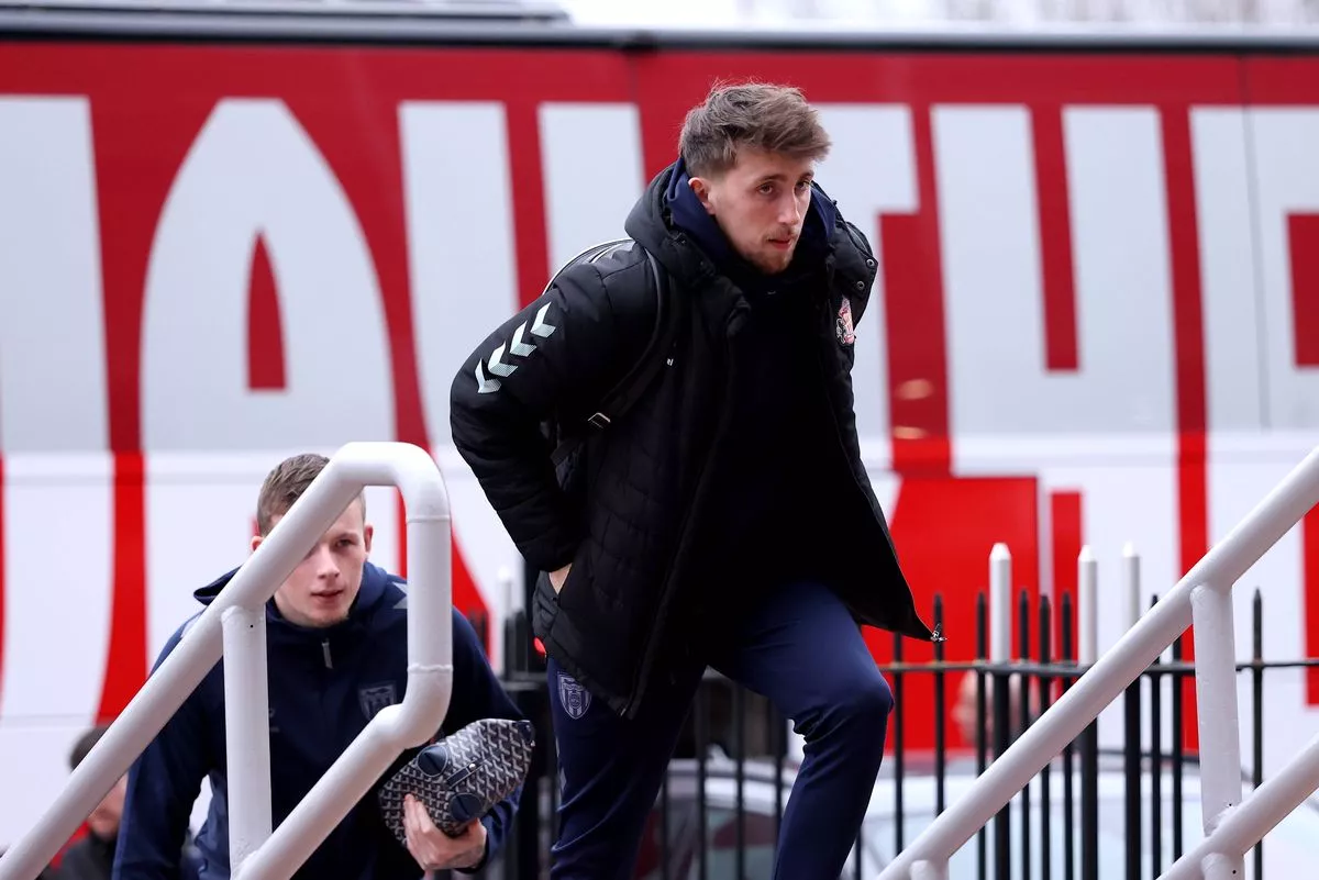 Dan Neil of Sunderland arrives at the stadium prior to the Premier League match between Sunderland and Leeds United at Stadium of Light