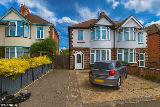 The seemingly AI-enhanced image of a home in the Cowley area of Oxford. The front door's window sits out of skew with the frame - and the door itself has no handle