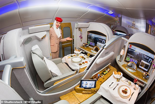 Flying First Class in 2025 is all about privacy - with flat-bed cocoons the norm on most airlines. Pictured: An Emirates First Class cabin