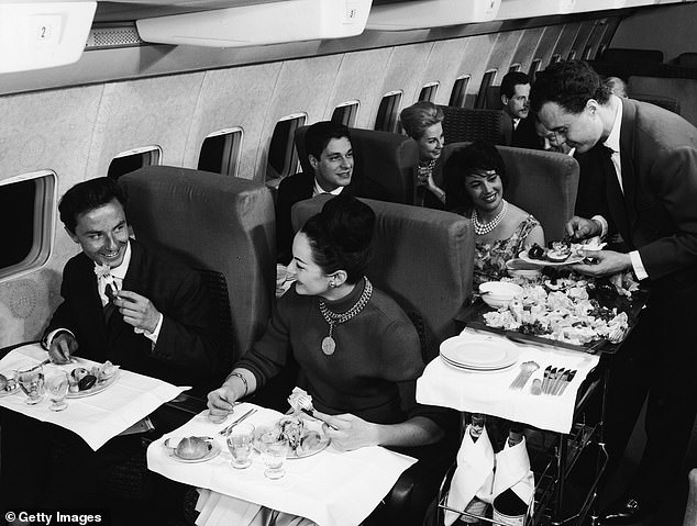 Pictured: An interior view of the First Class compartment of a commercial passenger plane in the 1950s