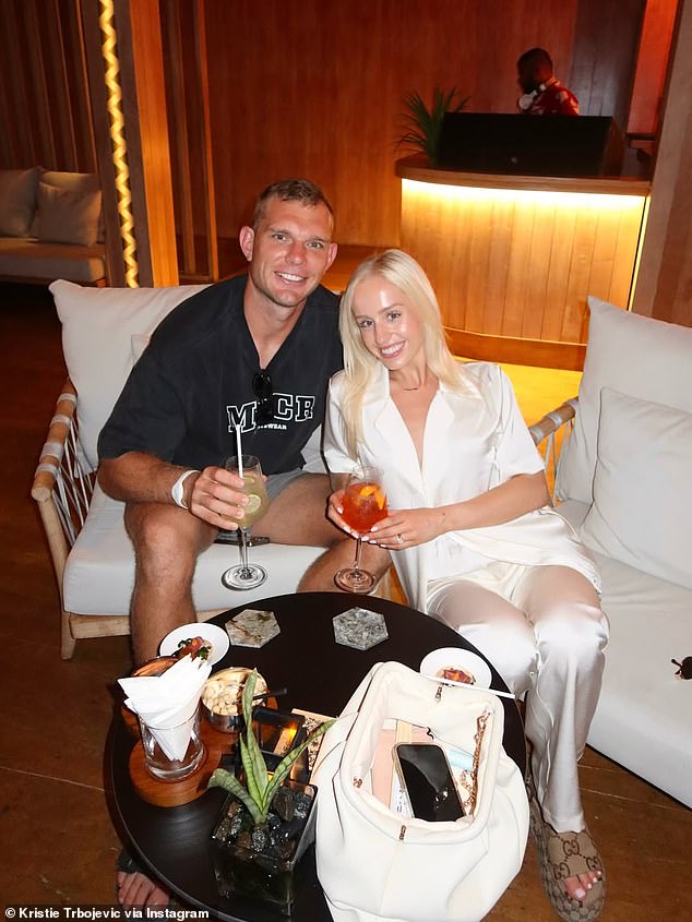 The happy couple also smiled as they posed for a picture as they enjoyed a few drinks at the hotel bar