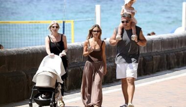 Sam Burgess took his young family for a stroll along Sydney's Coogee Beach on Sunday, only weeks after welcoming his second child