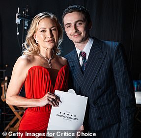 Timothee Chalamet earned best actor for Marty Supreme as he is seen posing with Kate Hudson