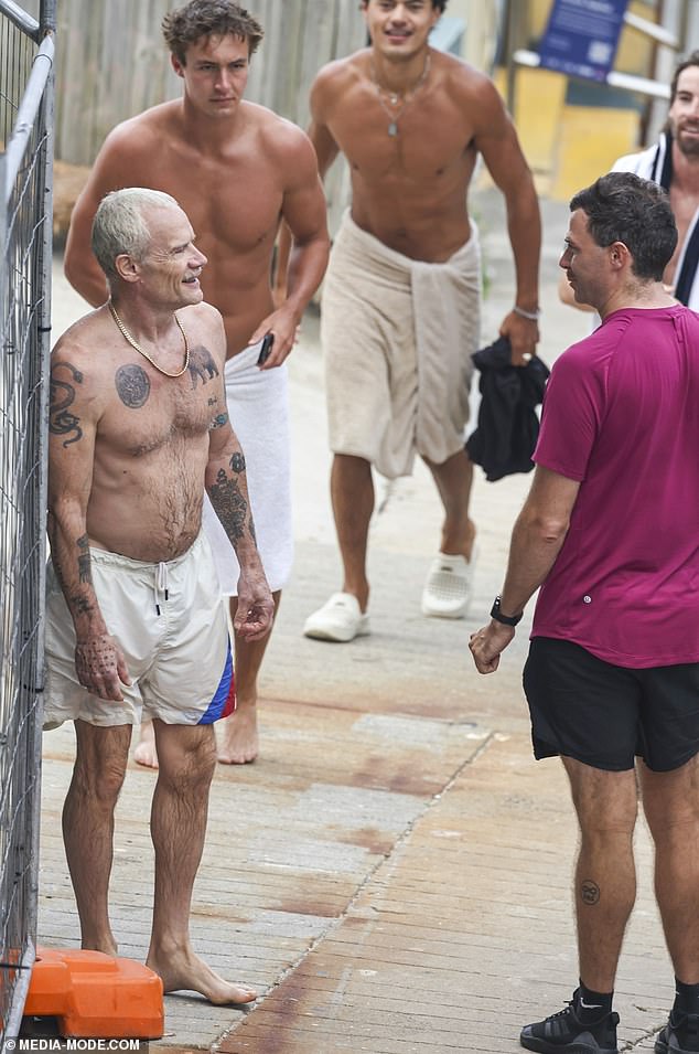 The beloved rocker, whose real name is Michael Balzary, looked to be having the time of his life as he chatted with fans while strolling through the popular tourist destination