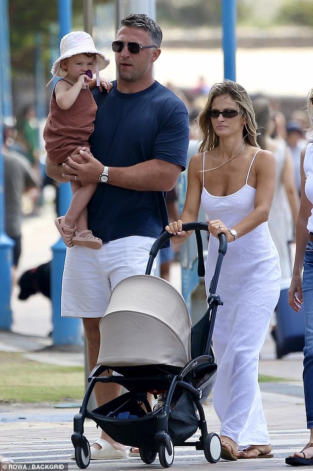 The couple, who are proud parents to newborn son Mack and daughter Robbie, 2, were spotted taking a beachside stroll in Coogee on Tuesday