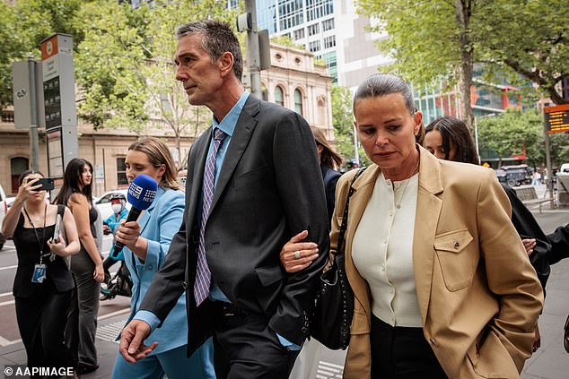 Jo Silvagni and husband Stephen are seen leaving the County Court of Victoria on December 5