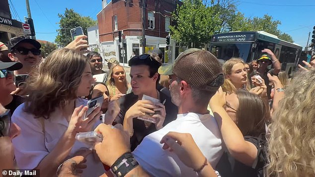 Fans hoping to get their hands on the singer - who was expected to arrive at 12:30pm - began lining up around the block from the early morning, with a crowd already assembling at 6:30am