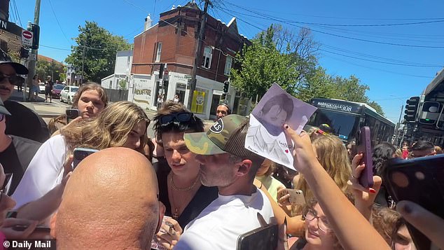 By the time Yungblud, real name Dominic Richard Harrison, showed up about an hour late, around 400 frenzied fans crushed in around him, begging for selfies and autographs