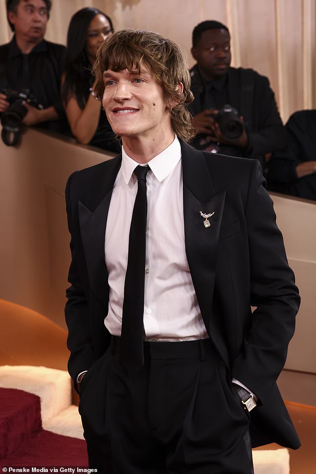 Connor Storrie looked cool as ever in a Saint Laurent suit