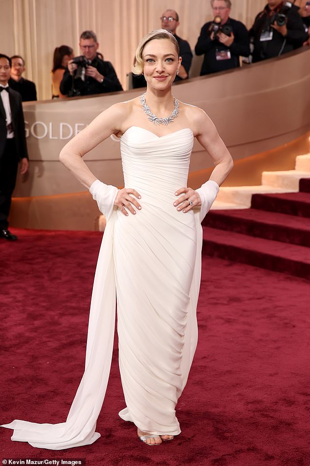 The Housemaid star Amanda Seyfried looked angelic in a white Versace gown