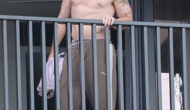 He may be weathering a scandal, but AFL star Lachie Neale showed no sign of strain as he checked out the balcony of his new Brisbane bachelor pad last Thursday