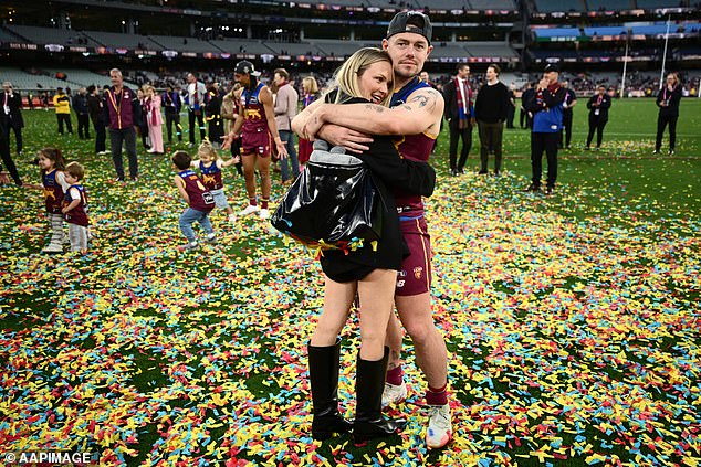 Neale is pictured with Jules after winning last year's grand final. Late last year, she allegedly uncovered the 'betrayal' that ended their marriage