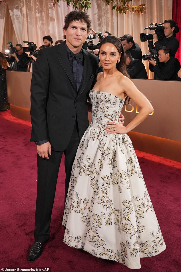 Mila Kunis was joined by husband Ashton Kutcher at the event, marking their first awards show outing in four years. She wowed in a Carolina Herrera gown