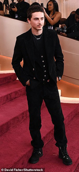 He sported boots instead of dress shoes