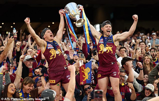 Neale (pictured celebrating the 2025 grand final win with teammate Dayne Zorko) is a two-time Brownlow Medallist and double premiership winner