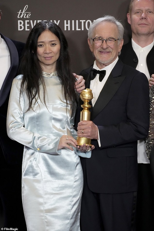 Zhao and executive producer Stephen Spielberg seen with the top prize in the press room