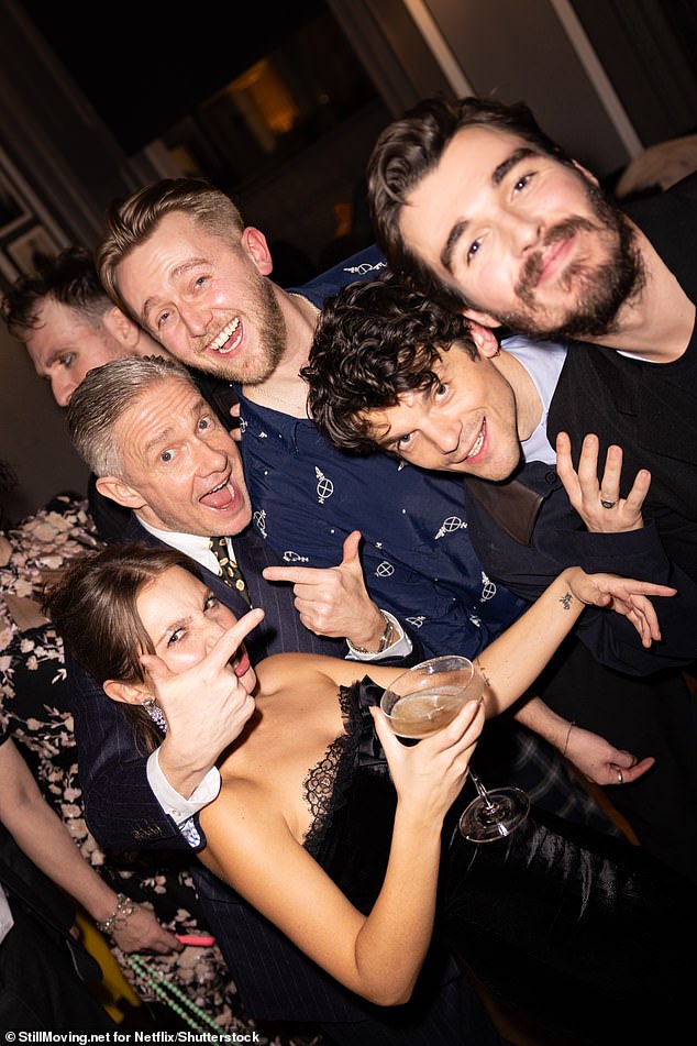 Martin was seen posing for a snap with co-stars Mia, Edward and Corey as well as Tim Preston