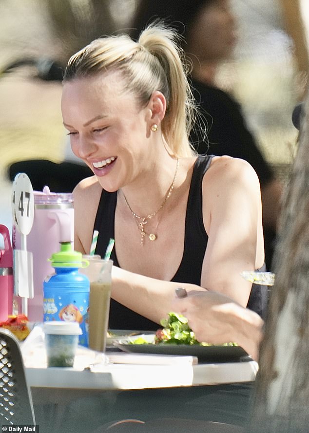 Jules Neale is smiling in the face of heartbreak, even after her world came crashing down following the breakdown of her marriage to AFL star Lachie Neale