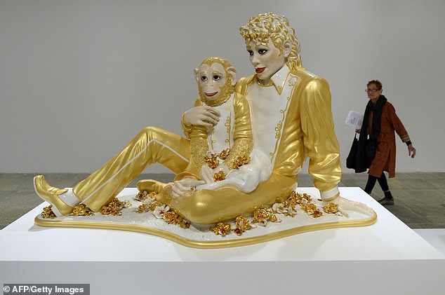 Jeff Koons' sculpture titled 'Michael Jackson and Bubbles' is pictured at the Whitney Museum of American Art in NYC in 2014
