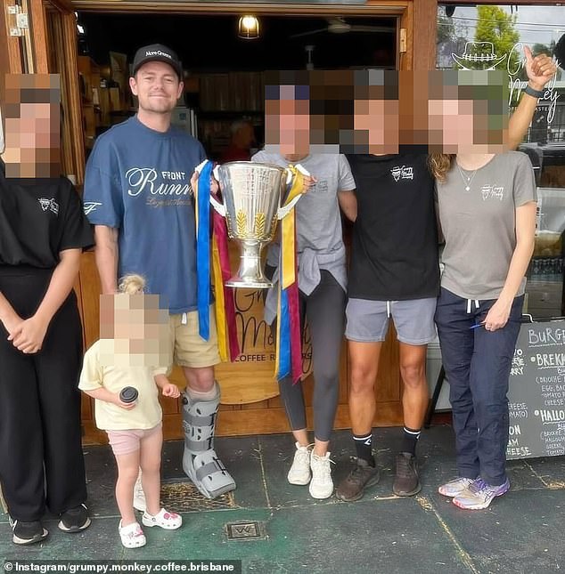 Lachie Neale is seen at the Grumpy Monkey café in 2024. An eyewitness who saw him and Tess there together assumed the brunette with 'piercing blue eyes' was the family's babysitter