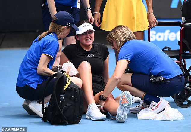Hon was leading 1-6, 6-4, 5-3 when her Canadian rival (centre) needed treatment for severe leg cramps on ANZ Arena on Monday