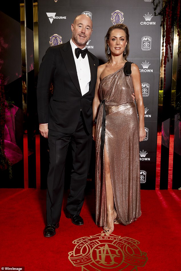 Luke Sayers is facing a defamation lawsuit from his own wife, Cate Sayers, according to a new report. Pictured together in 2024