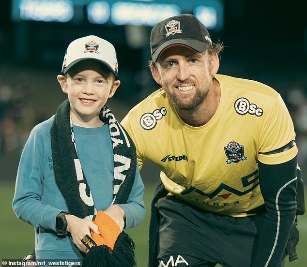 Alex Clarke (right) has died after battling a rare brain cancer