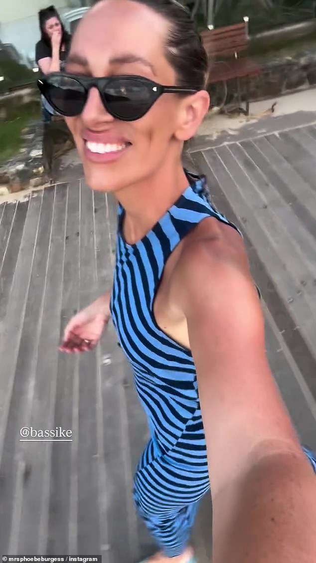 Another showed the blonde beauty flaunting her slender figure in a $298 black and blue striped tank dress from Australian label Bassike