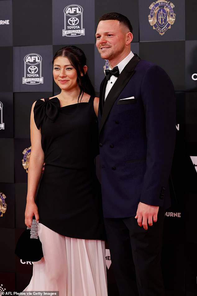 Melbourne Demons star Steven May (pictured with partner Sachi) was charged with affray over his alleged involvement in the fight just after Boxing Day in 2024
