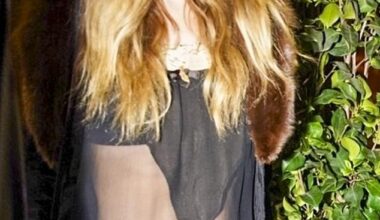 Jennifer Lawrence showed off her taut midriff in a sheer black top while stepping out for dinner in Paris on Saturday