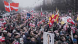 Protesters with Danish and Greenlandic flags attend a demonstration in Copenhagen, Denmark, Jan. 17, 2026.