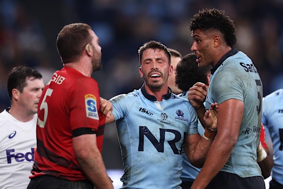 Miles Amatosero (right) squares up to a Crusaders’ opponent.