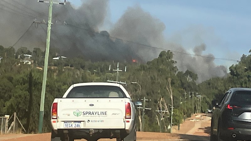 Perth hills bushfire downgraded to watch and act