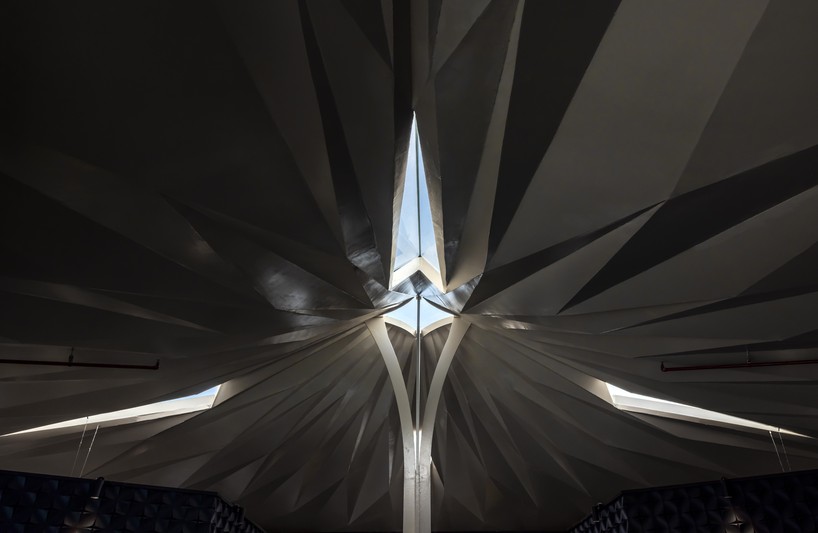 luminous origami-inspired steel roof by takashi niwa ornaments restaurant in vietnam