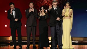 SANTA MONICA, CALIFORNIA - JANUARY 04: (L-R) Benicio del Toro, Leonardo DiCaprio, Cassandra Kulukundis, Paul Thomas Anderson and Chase Infiniti, winners of the Best Picture Award for "One Battle After Another", speak onstage during the 31st Annual Critics Choice Awards at Barker Hangar on January 04, 2026 in Santa Monica, California.  (Photo by Kevin Winter/Getty Images for Critics Choice Association)