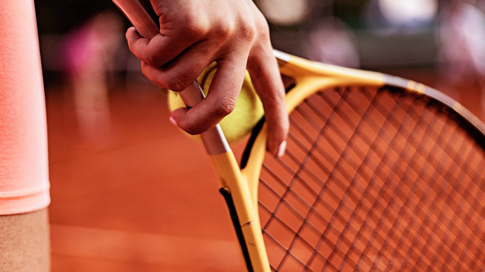 female tennis player holding racket