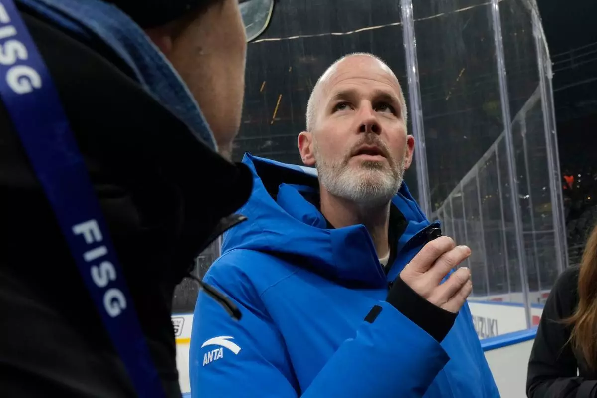 Pierre Ducrey, IOC Sport Director answers reporters at the Santa Giulia Ice Hockey Arena, where Ice Hockey discipline of the Milan Cortina 2026 Winter Olympics will take place, in Milan, Italy, Friday, Jan. 9, 2026. (AP Photo/Luca Bruno)