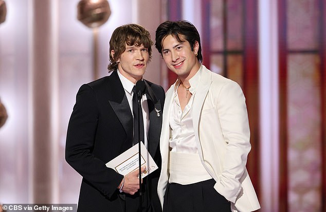 BEVERLY HILLS, CALIFORNIA - JANUARY 11: (L-R) Connor Storrie and Hudson Williams speak onstage during the 83rd Annual Golden Globe Awards at The Beverly Hilton on January 11, 2026 in Beverly Hills, California. (Photo by Kevork Djansezian/CBS via Getty Images)