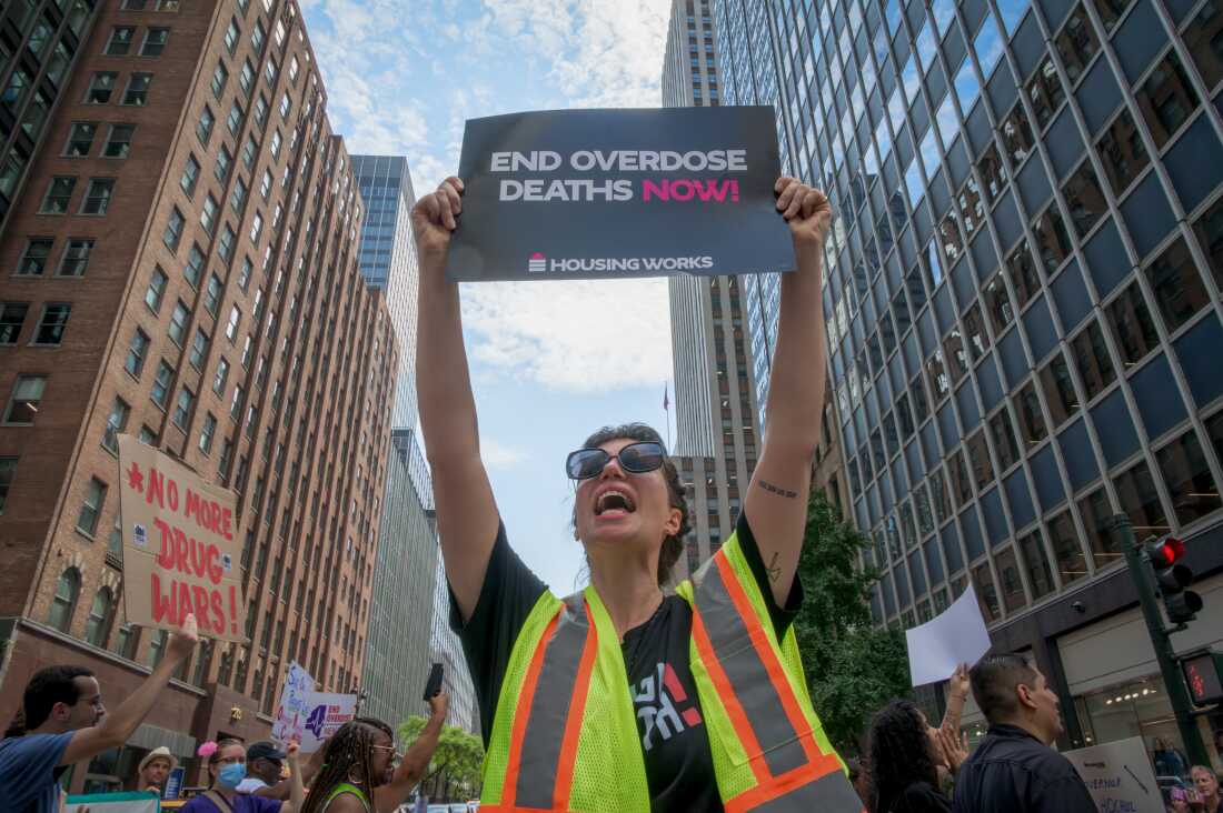 A demonstrator holds a sign during International Overdose Awareness Day on Aug. 28, 2024, in New York City.
