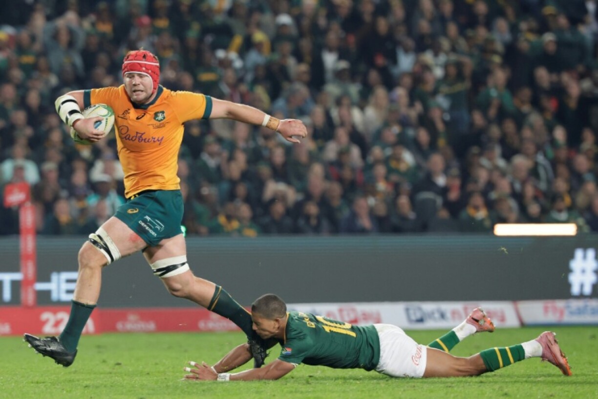 Wallabies skipper Harry Wilson (L) will miss the start of the Super Rugby season after minor knee surgery