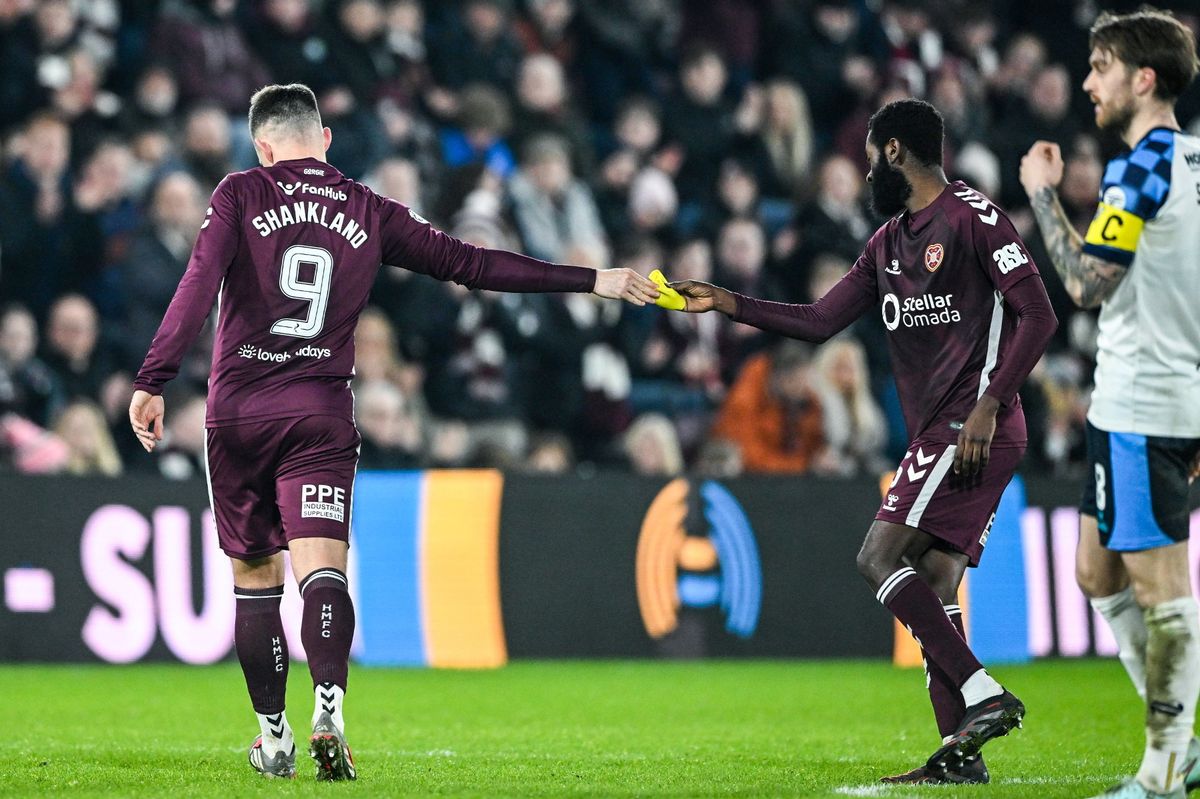 Lawrence Shankland goes off injured against Falkirk