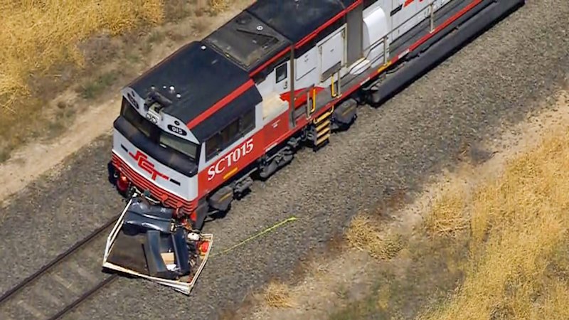 Two killed in train crash at level crossing west of Melbourne